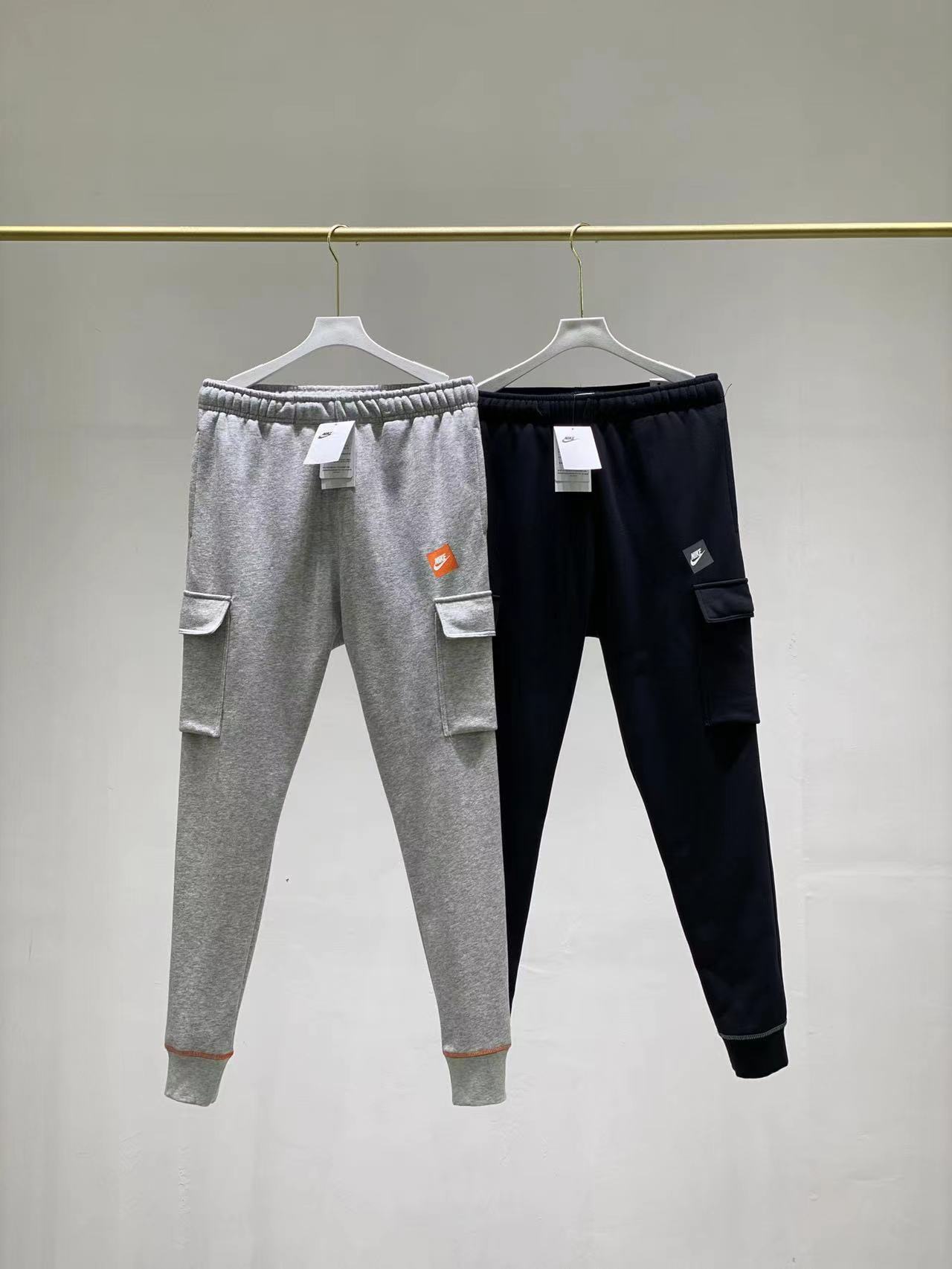 Nike Patchwork Cargo-Style Cuffed Sweatpants (Gray/Navy Two-Tone)