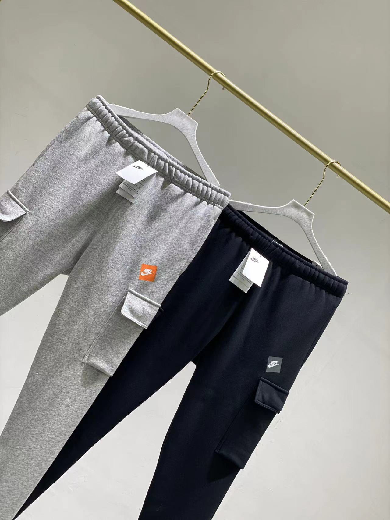 Nike Patchwork Cargo-Style Cuffed Sweatpants (Gray/Navy Two-Tone) - Image 2